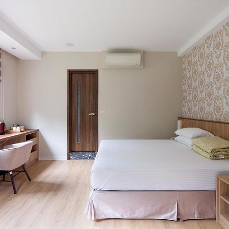 לוגו 名竹旅社 Minzu Hotel מראה חיצוני תמונה