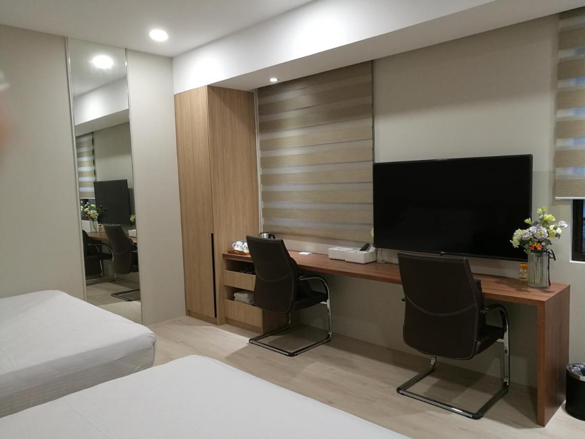 לוגו 名竹旅社 Minzu Hotel מראה חיצוני תמונה