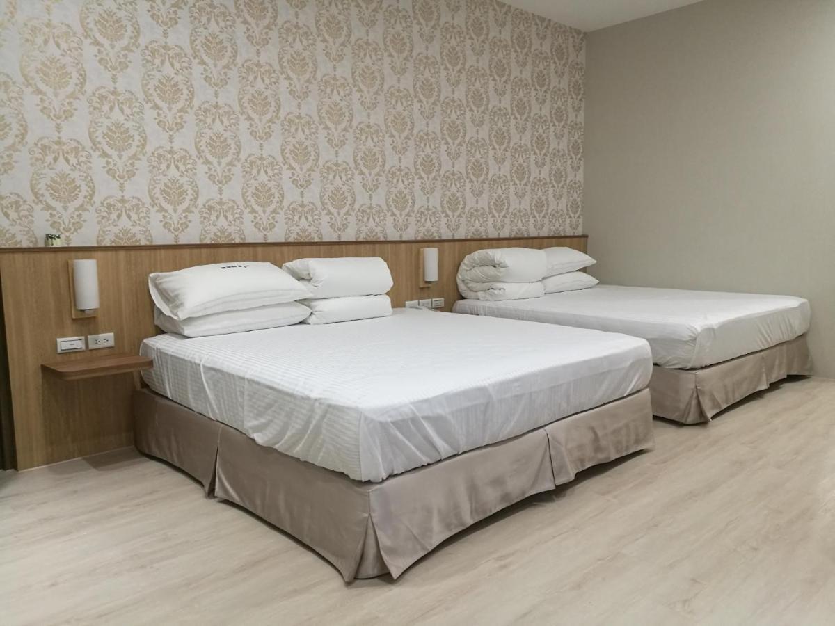 לוגו 名竹旅社 Minzu Hotel מראה חיצוני תמונה