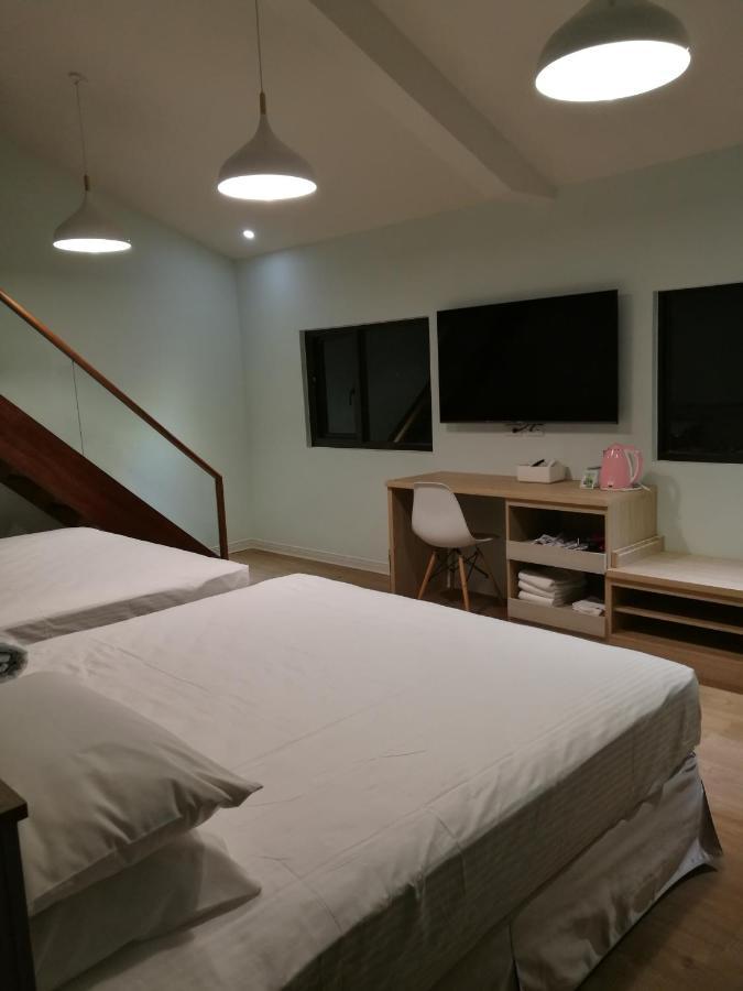 לוגו 名竹旅社 Minzu Hotel מראה חיצוני תמונה