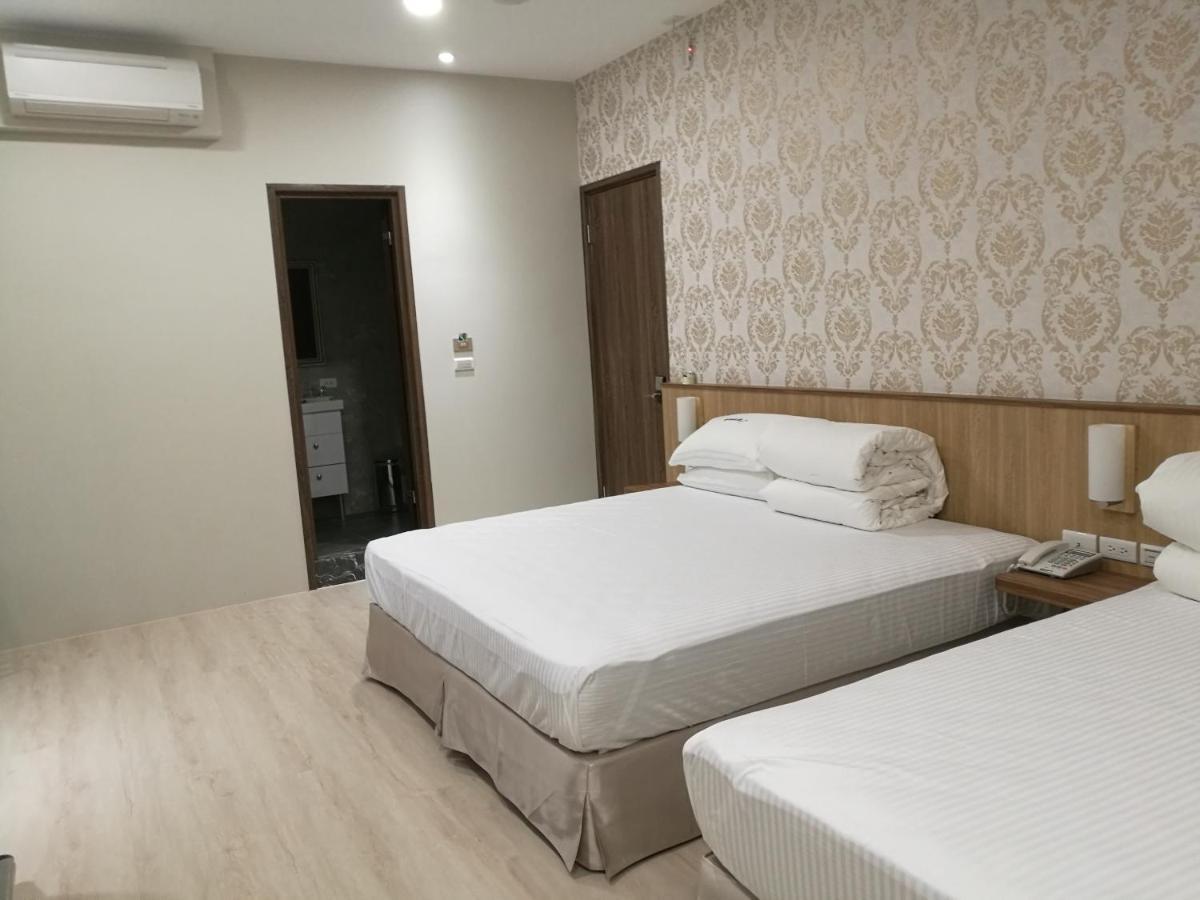 לוגו 名竹旅社 Minzu Hotel מראה חיצוני תמונה