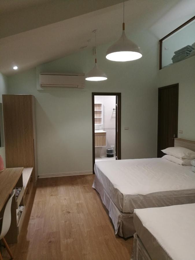 לוגו 名竹旅社 Minzu Hotel מראה חיצוני תמונה