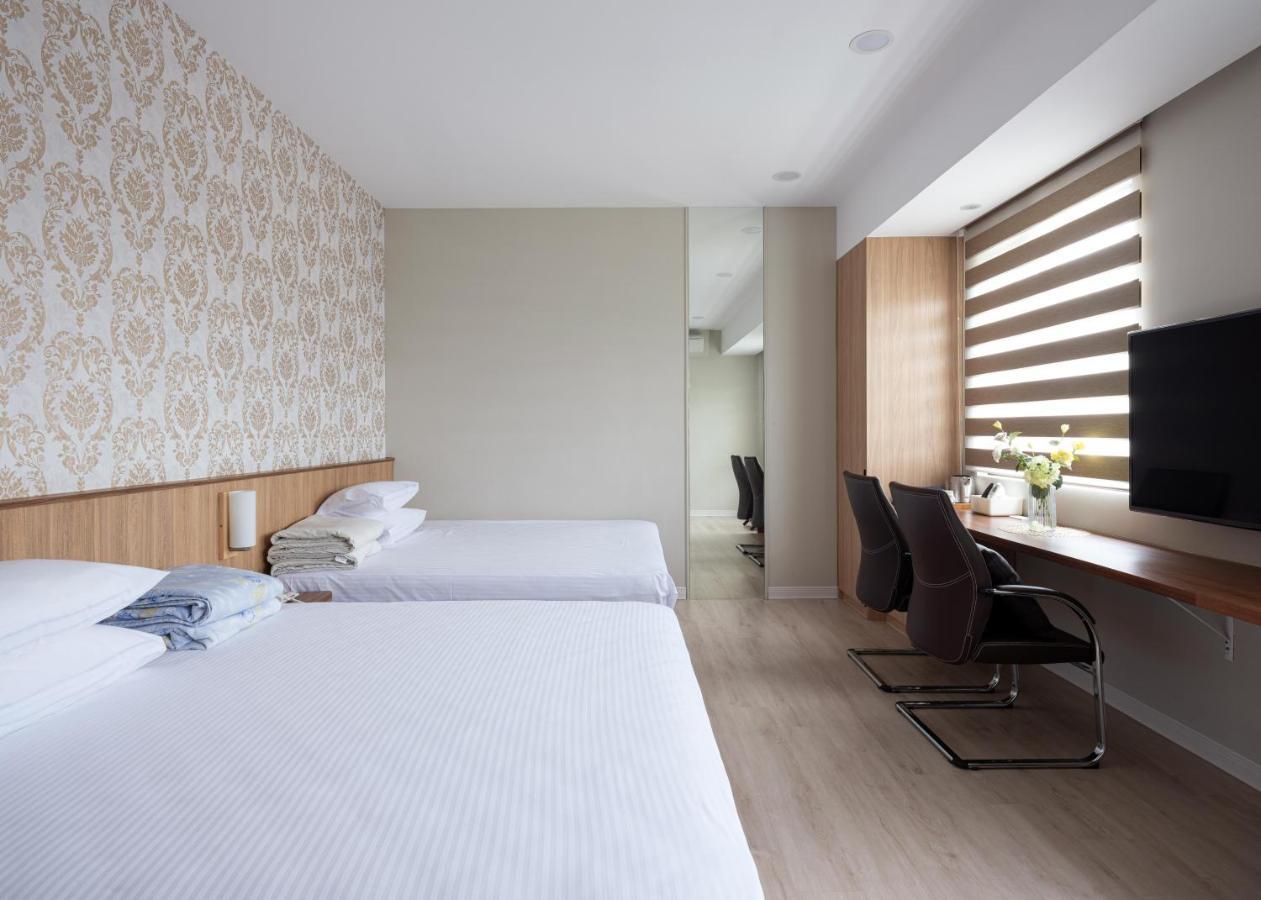 לוגו 名竹旅社 Minzu Hotel מראה חיצוני תמונה