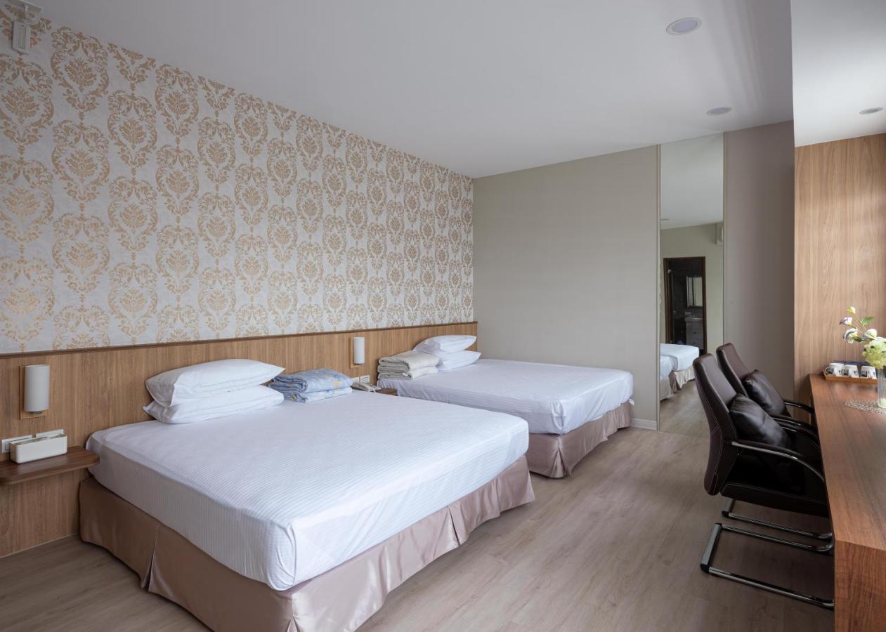 לוגו 名竹旅社 Minzu Hotel מראה חיצוני תמונה