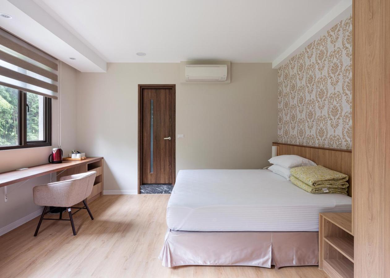 לוגו 名竹旅社 Minzu Hotel מראה חיצוני תמונה