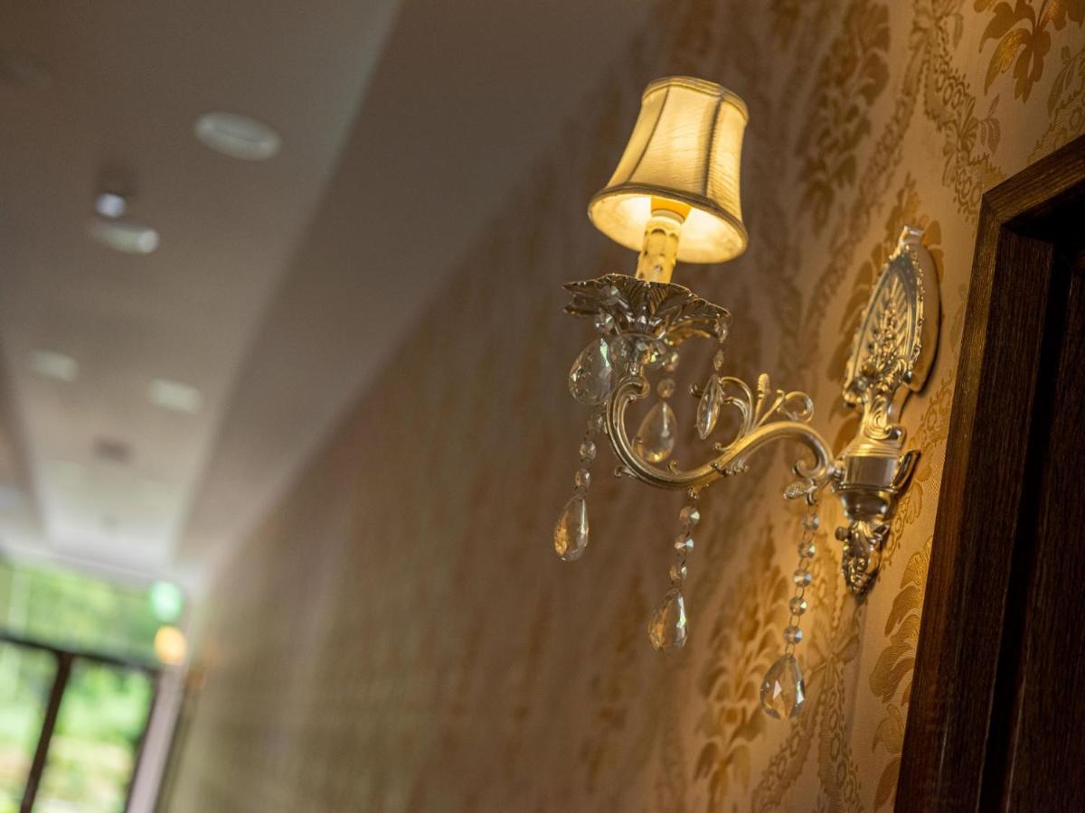 לוגו 名竹旅社 Minzu Hotel מראה חיצוני תמונה