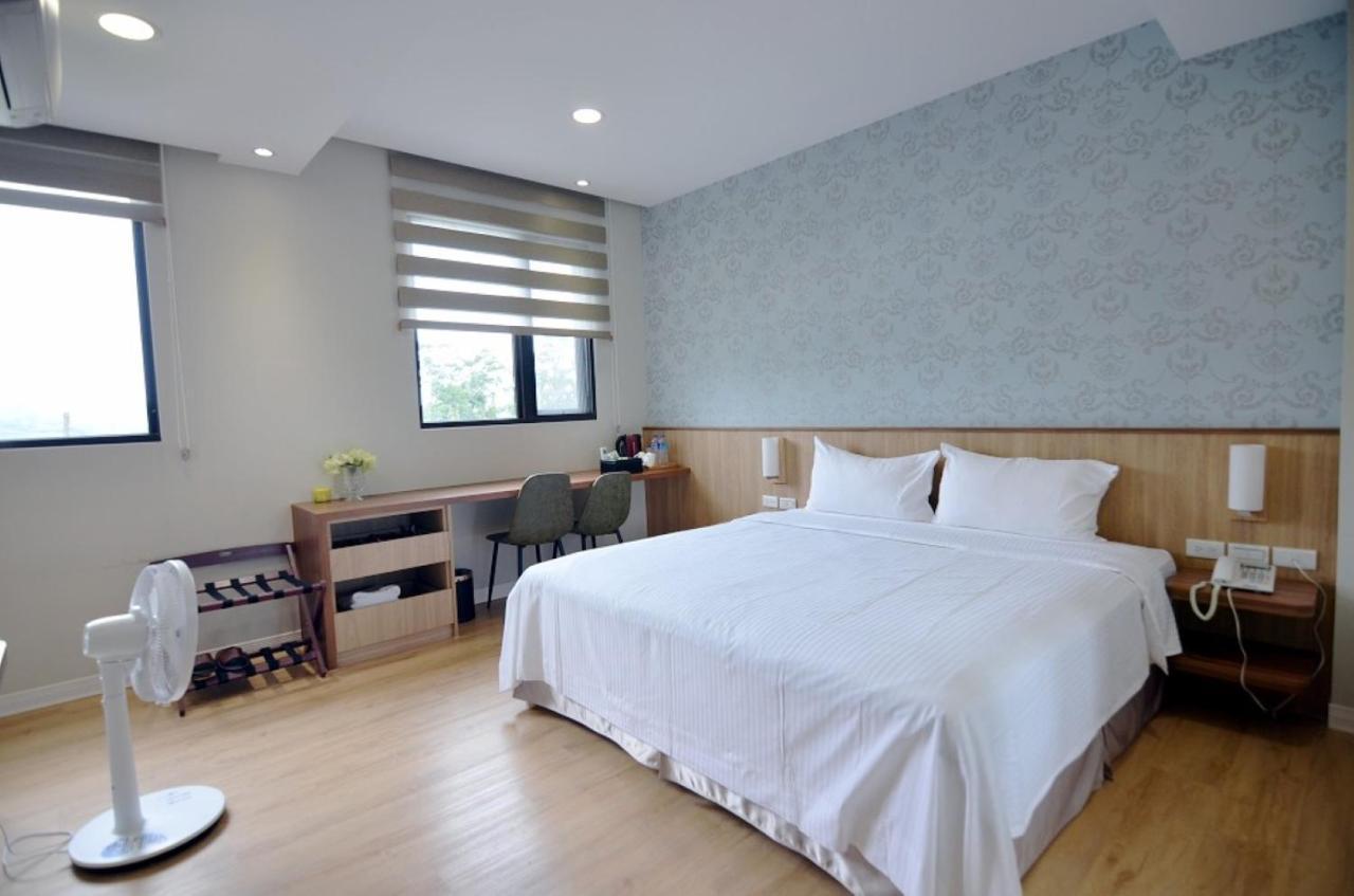 לוגו 名竹旅社 Minzu Hotel מראה חיצוני תמונה